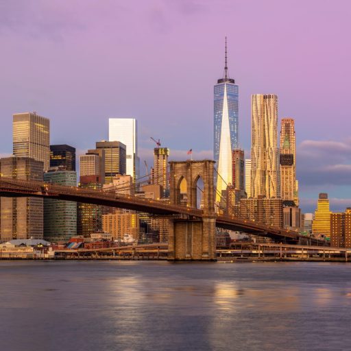 new-york-city-moning-view-manhattan-with-skyscrapers-famous-brooklin-bridge-min